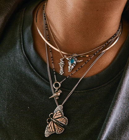 Consuela Cardinal Charm
 – Consuela
